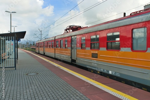 red electric train in the station