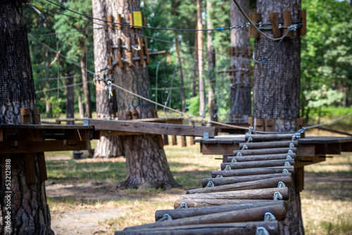 High ropes experience adventure tree park. Rope road course in t