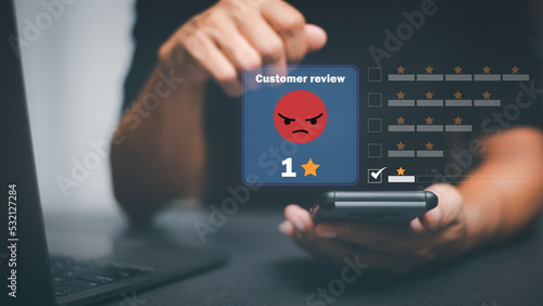 Male consumers express dissatisfaction after receiving a product or service. Negative rating ideas from a business or product. Online ratings, performance data, and evaluation of genuine user reviews.