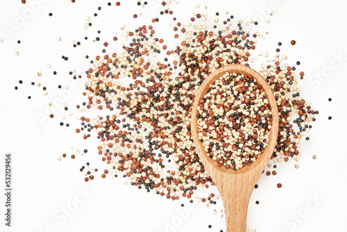 top view or flat lay quinoa seeds in wooden spoon isolated on white background. close up quinoa seeds in wooden spoon isolated on white background. quinoa seeds in spoon isolated