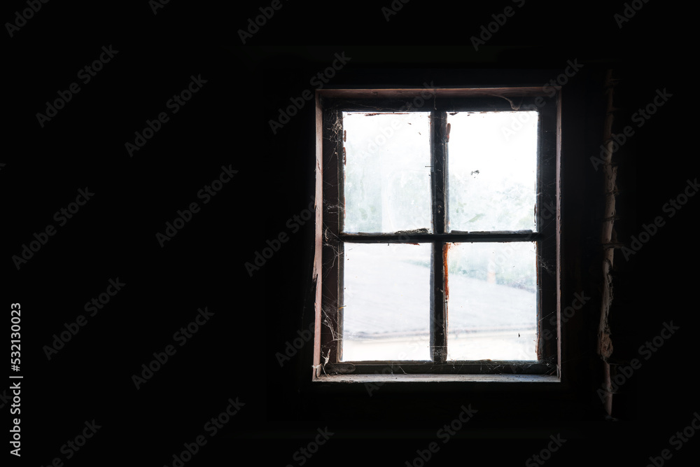 Old window in the attic Old window in the attic