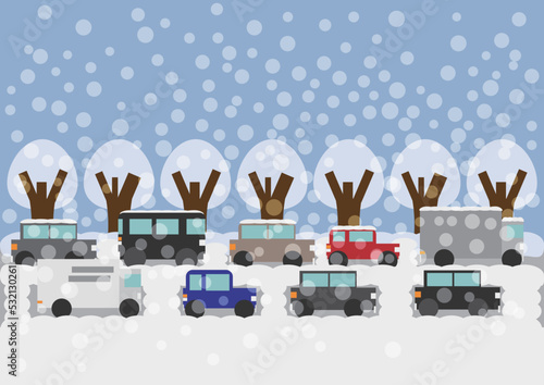 大雪で立往生する車の列