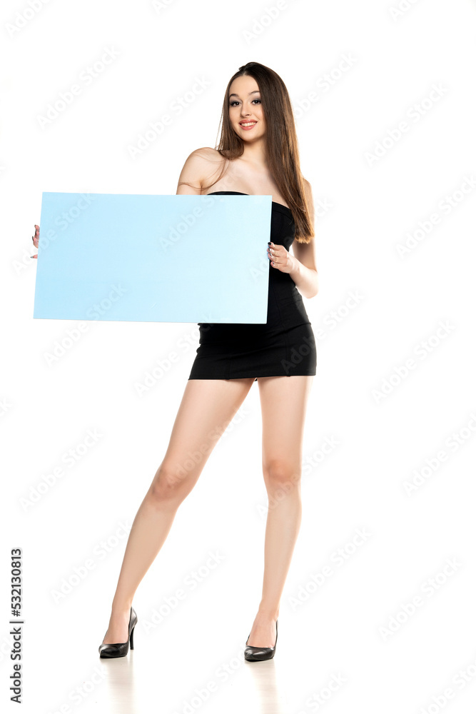 portrait of a young smiling woman advertise some product. portrait of a young smiling woman advertise some product.