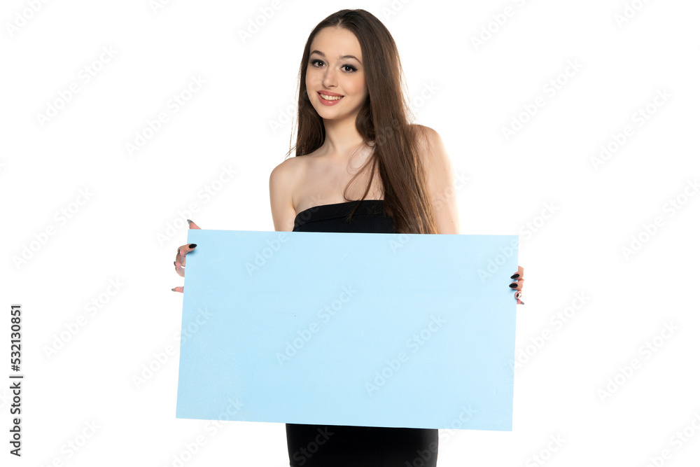 portrait of a young smiling woman advertise some product. portrait of a young smiling woman advertise some product.