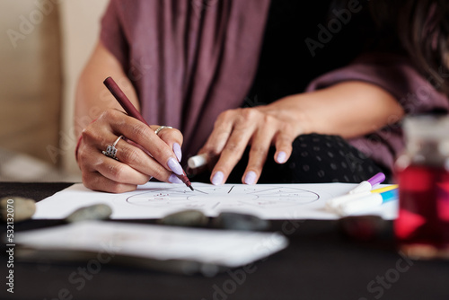 Valokuva Astrologer Drawing Birthday Chart