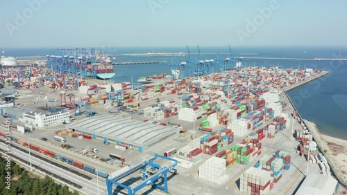 large industrial container ship being unloaded using cranes.Business industry Logistics Import export Freight transportation containers. Loading unloading container ship. Gdansk Poland 