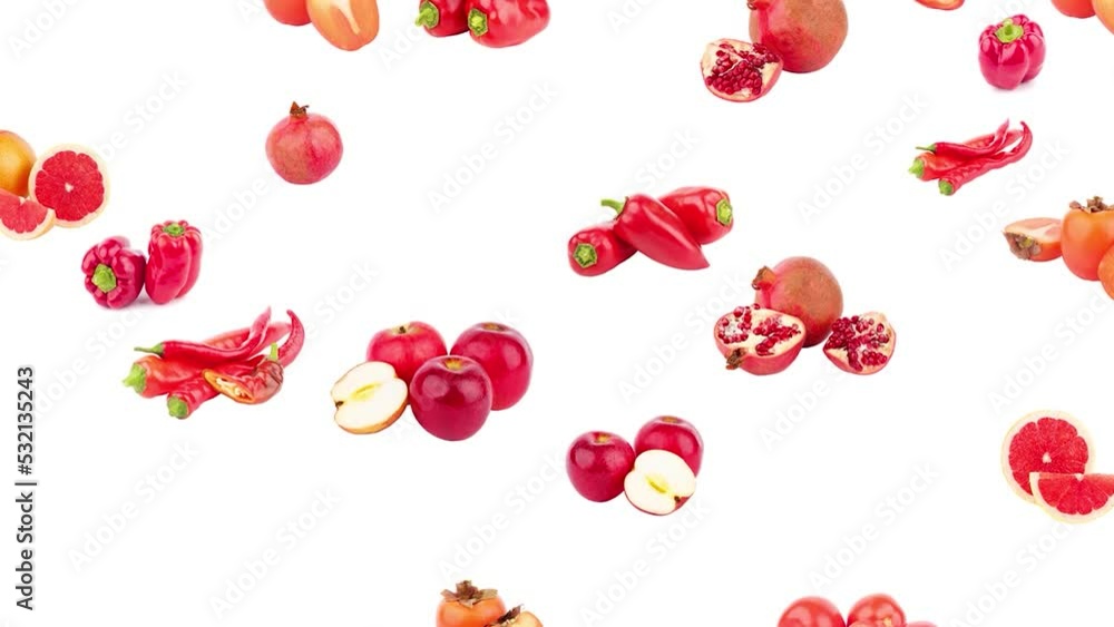 Background made from different red fruits and vegetables, isolated on the white. Stop motion, animation footage Background made from different red fruits and vegetables, isolated on the white. Stop motion, animation footage