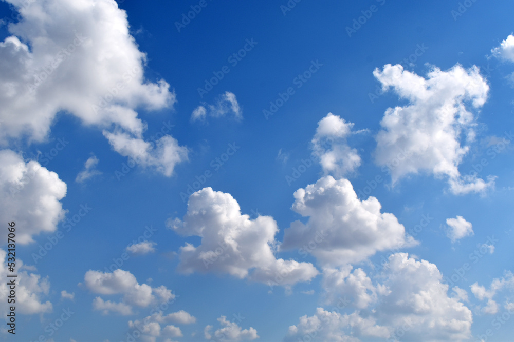 White clouds with blue sky in a sunny day. Pastel colour of sky in the morning. Concept of new life beginning, freedom of life and peaceful.