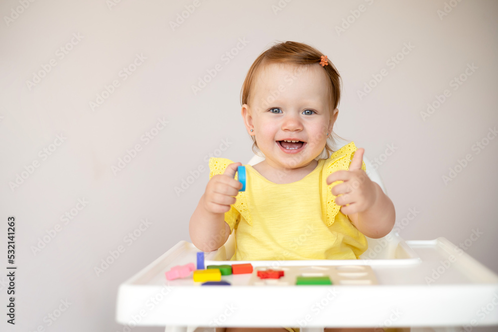 Emotional cute Baby is playing. Infant learning and development. Wooden eco-friendly educational toys. Montessori system. Emotional cute Baby is playing. Infant learning and development. Wooden eco-friendly educational toys. Montessori system.