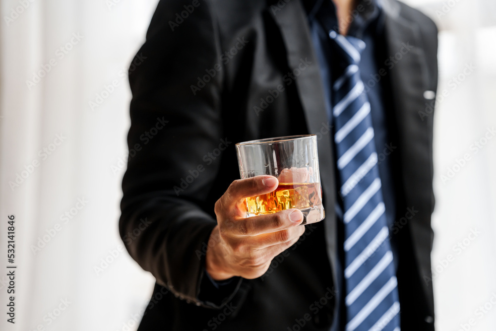 Sad depressed addicted drunk guy, Alone asian man drinker alcoholic sitting at bar counter with glass drinking whiskey. Sad depressed addicted drunk guy, Alone asian man drinker alcoholic sitting at bar counter with glass drinking whiskey.
