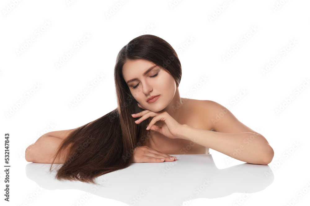 Young woman with strong healthy hair on white background Young woman with strong healthy hair on white background