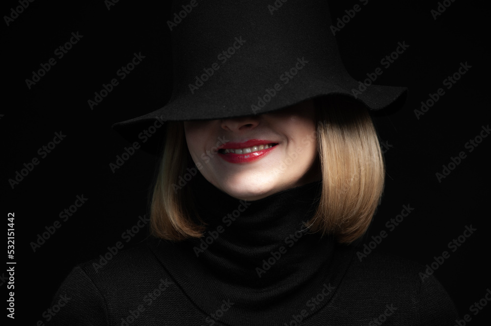 Woman in black dress and hat on background Woman in black dress and hat on background