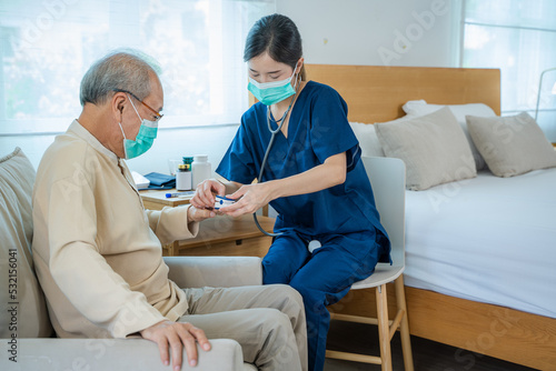 Nurse use pulse oximeter to measure senior man patient's blood oxygen saturation.