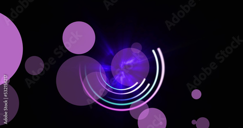 Images of moving blue and purple glowing shapes over black background