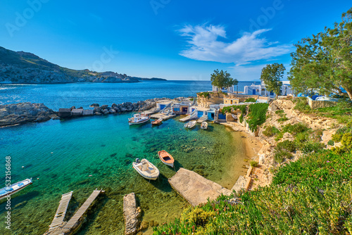 Remote fishermen village bay on Greek island on sunny summer day