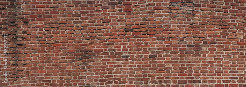 Panoramic view of an empty, old, red brick wall background with copy space