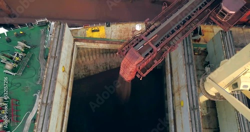 Loading Of Coal Into The Holds Of A Bulk Carrier In Paradip Port, Odisha, India - aerial drone shot photo