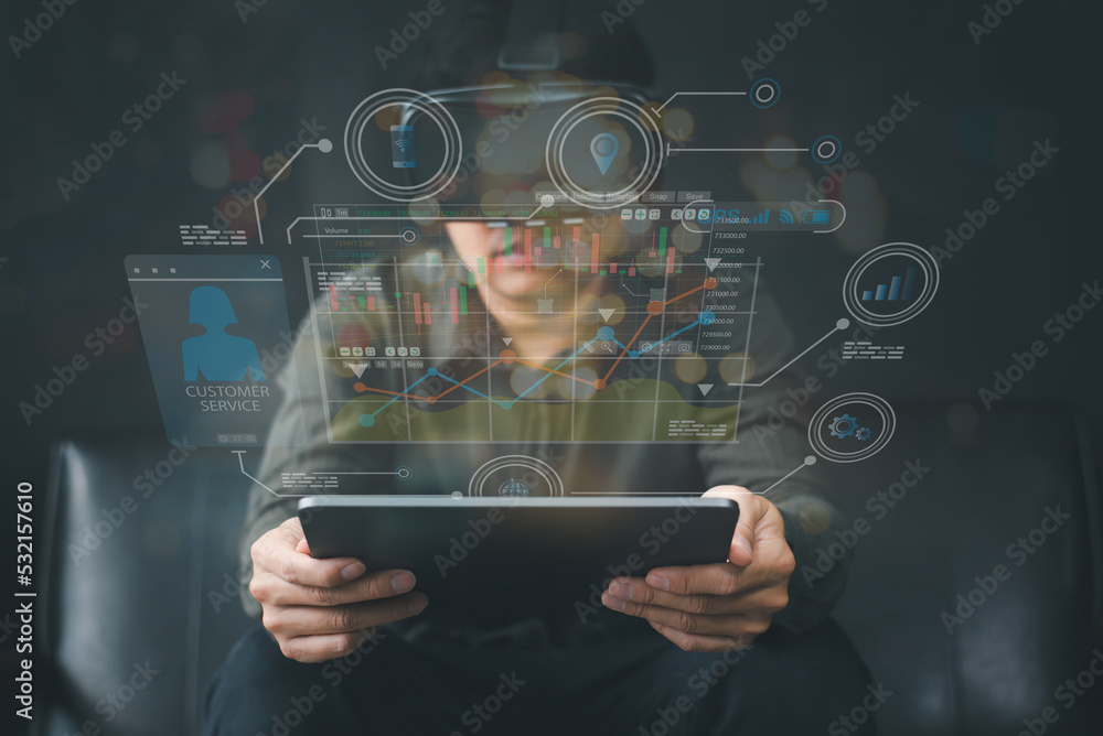 Asian man with VR glasses studying business path simulation sciences at home,curious student wears a virtual reality to study science home online study futuristic lifestyle learning Asian man with VR glasses studying business path simulation sciences at home,curious student wears a virtual reality to study science home online study futuristic lifestyle learning