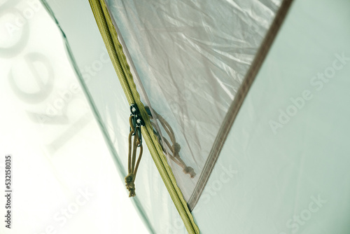 Yellow zipper of the inside of the tent when closed