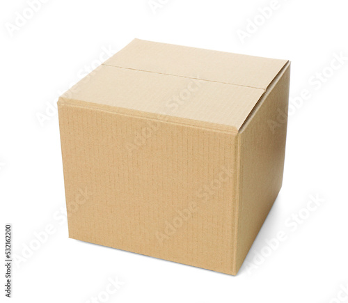One closed cardboard box on white background © New Africa
