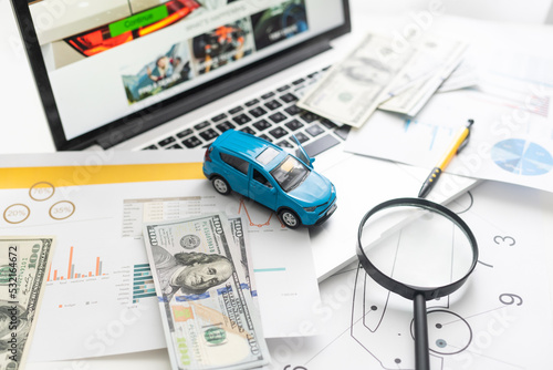 Toy car for banknotes as background