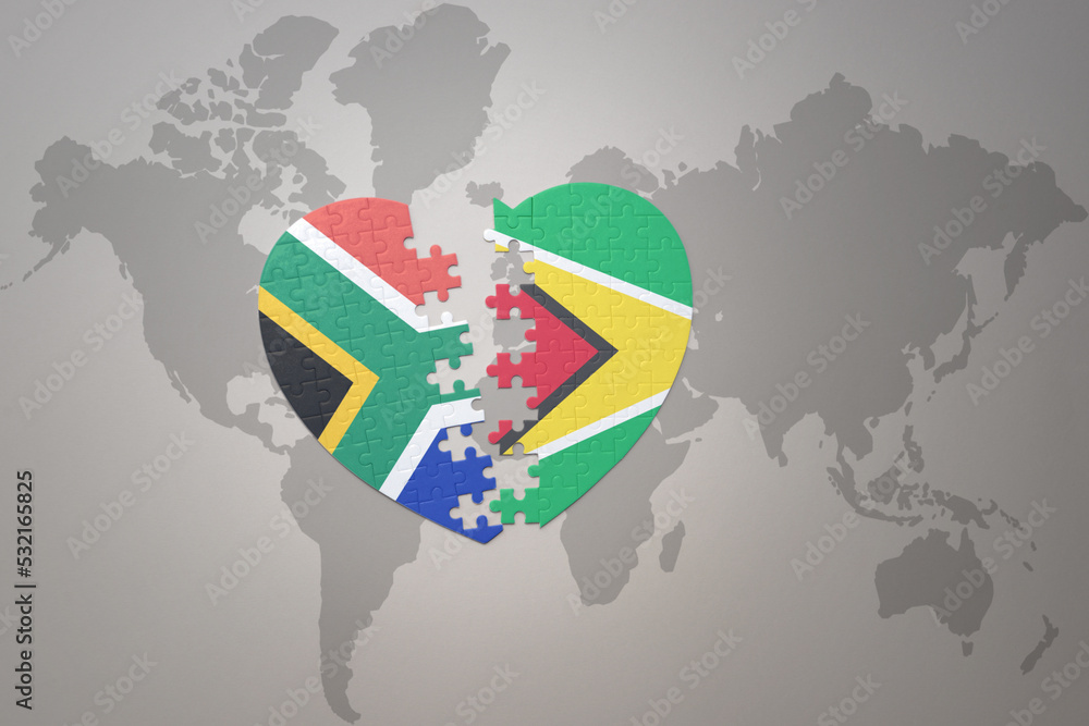 puzzle heart with the national flag of south africa and guyana on a ...
