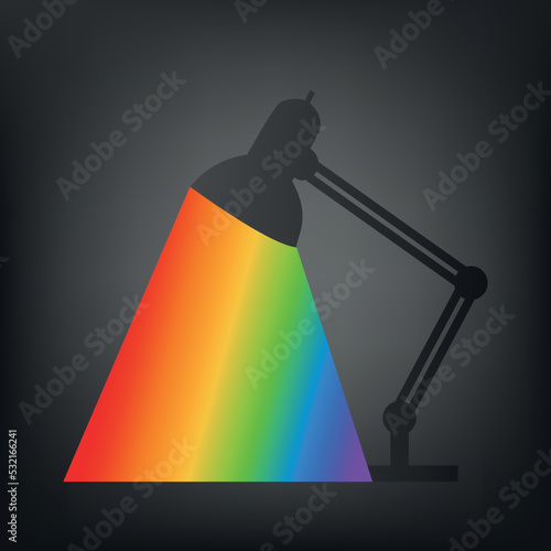 Black background with office lamp shining in rainbow colors