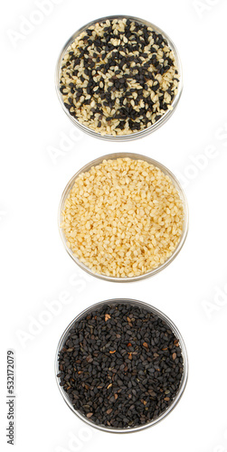 Three types of sesame seeds isolated on white background.