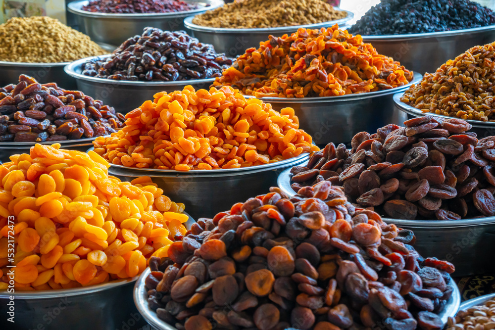 Close up of various of dried fruits at street market in Turkey. Local traditional market at Konyaalti Liman in Antalya, Turkey.