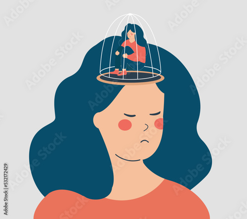 Woman with prisoner in cage instead of her brain. Female suffers from drug addiction, depression, rights restrictions, repression in the society. Concept of freedom of speech, mental health disorders.