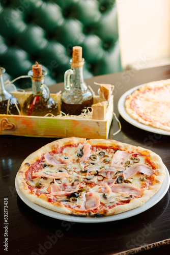 Beautiful pizza with a ham ...