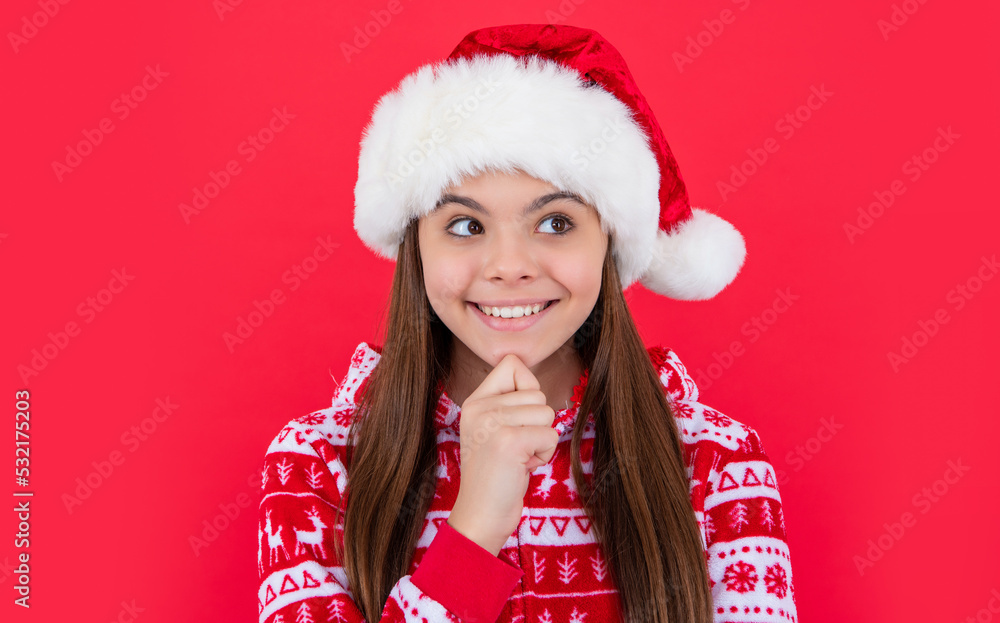 happy new year. cheerful teen girl in red new year santa hat in studio. teen santa new year girl happy new year. cheerful teen girl in red new year santa hat in studio. teen santa new year girl