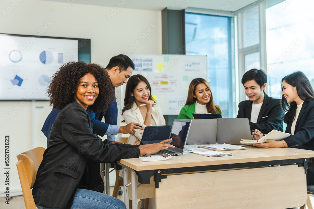 Mix race young start up business people meeting at office desk in modern workplace. Mix race young start up business people meeting at office desk in modern workplace.