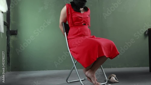 Asian woman abducted victim tied up in abandoned room