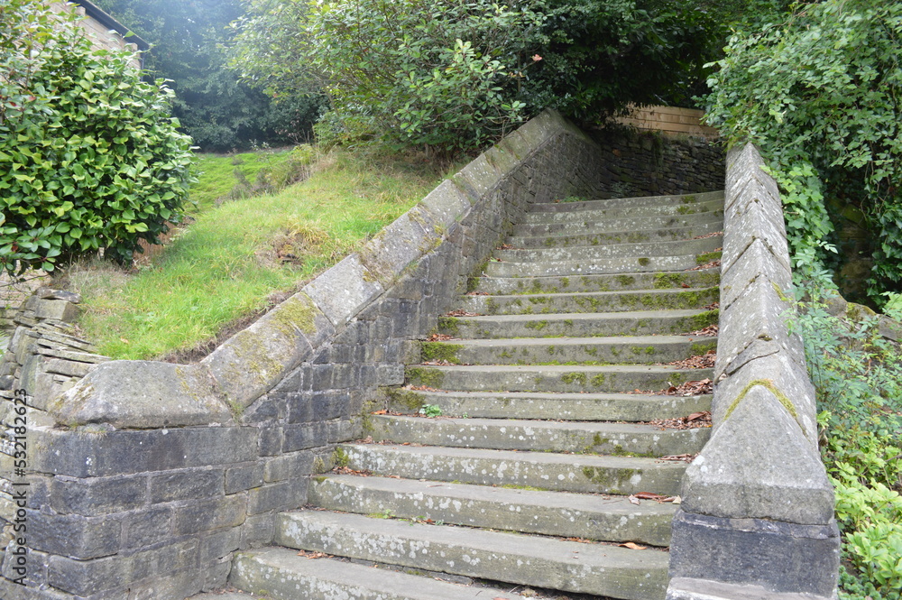 Stone steps leading up to a churchyard 