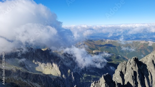 Clouds in mountains seen from the top of Lomnicki Stit in High Tatras, Slovakia