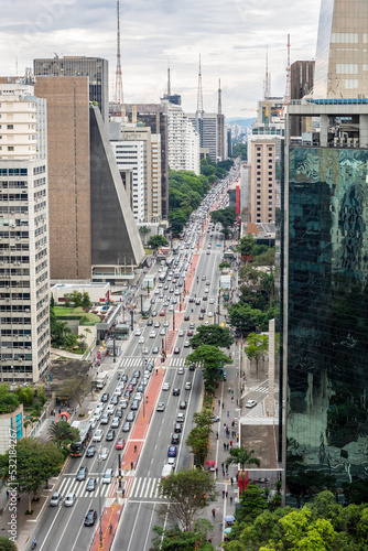 Beautiful aerial view of Paulista avenue  Sao Paulo city skyline. Street cityscape with modern buildings and car traffic. Concept of architecture  urban  metropolis  Brazil  South America.