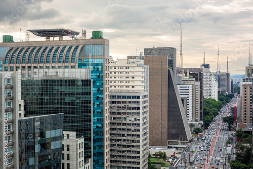 Beautiful aerial view of Paulista avenue, Sao Paulo city skyline. Street cityscape with modern buildings and car traffic. Concept of architecture, urban, metropolis, Brazil, South America.