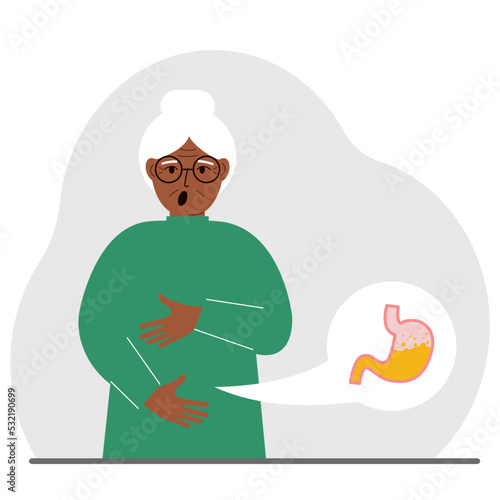 The concept of pain in the abdomen. The old woman holds his stomach with both hands. Problems with the stomach or digestion.