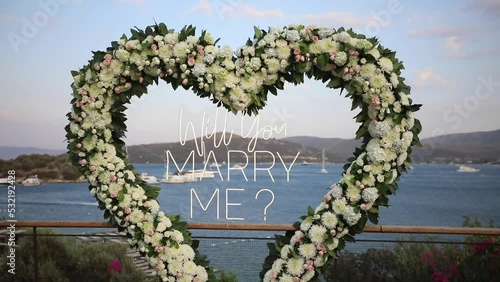 Beautiful marry me sign made by flowers.