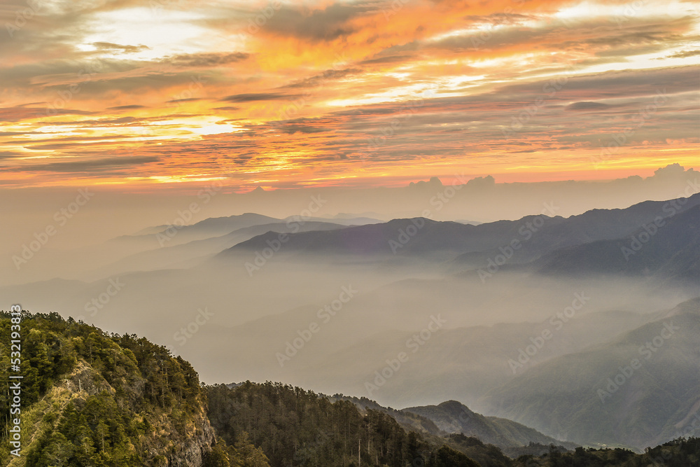 Obraz premium Landscape View Of The Holy Ridge And Nanhu Zhongyangjian Mountain With Amazing Sunriset On The Peak of Tao Mountaion, Wuling Quadruple Mountains Trail, Shei-Pa National Park, Taiwan
