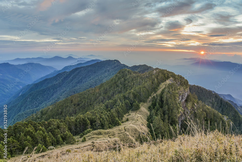 Landscape View Of The Holy Ridge And Nanhu Zhongyangjian Mountain With Amazing Sunriset On The Peak of Tao Mountaion, Wuling Quadruple Mountains Trail, Shei-Pa National Park, Taiwan Landscape View Of The Holy Ridge And Nanhu Zhongyangjian Mountain With Amazing Sunriset On The Peak of Tao Mountaion, Wuling Quadruple Mountains Trail, Shei-Pa National Park, Taiwan