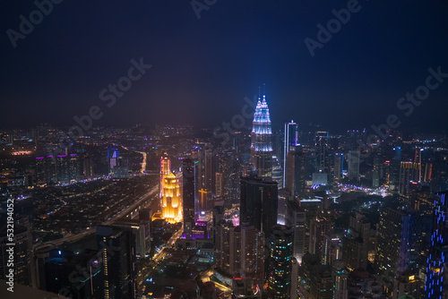 Kuala Lumpur  Malaysia  2019. Petronas twin towers at night with view on city lights