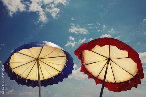 red umbrella and blue sky