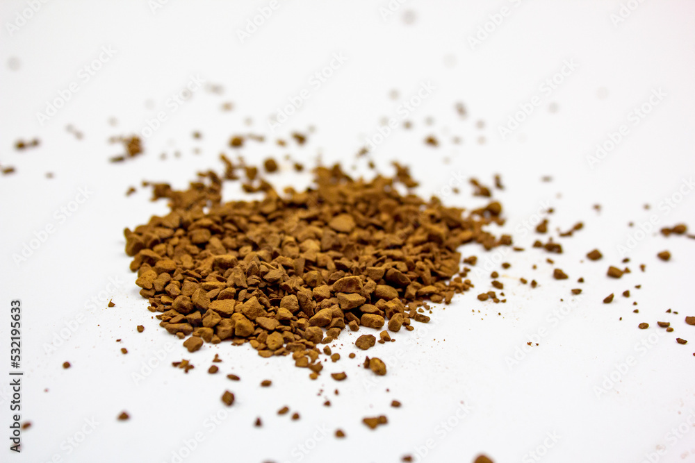 Coffee black instant on an isolated white background. Granules of instant natural coffee.