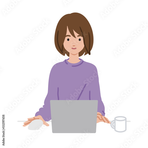 デスクで座ってPCを使っているリモートワークの女性