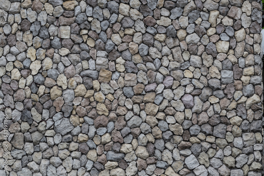 A stone wall made of polygonal stones joined by concrete provides strength and is ideal as a backdrop. A stone wall made of polygonal stones joined by concrete provides strength and is ideal as a backdrop.