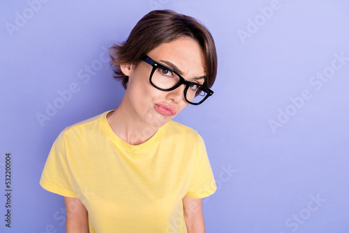 Fototapeta Naklejka Na Ścianę i Meble -  Closeup photo of young attractive pretty gorgeous woman wear eyeglasses boss businesswoman pouted lips look you unsure isolated on pastel purple color background