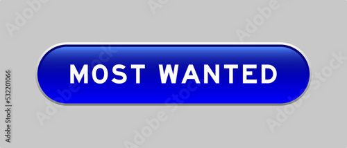 Blue color capsule shape button with word most wanted on gray background