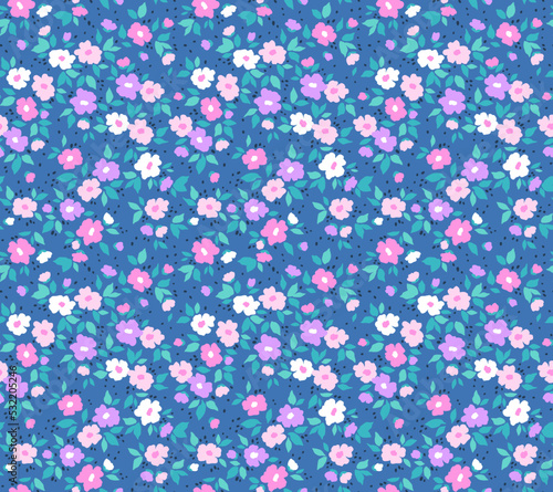 Vector seamless pattern. Pretty pattern in small flowers. Small colorful pastel flowers. Pale blue background. Ditsy floral background. The elegant the template for fashion prints. Stock vector.